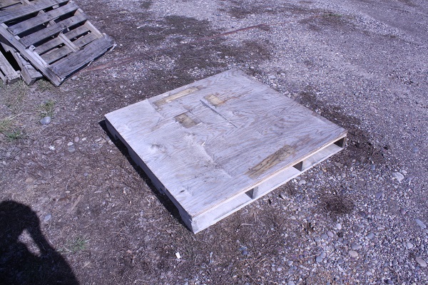 Pallet with plywood attached to top